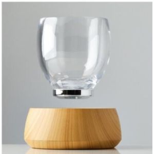 Quality 360 rotating magnetic floating bottom coffee cup water cup for sale