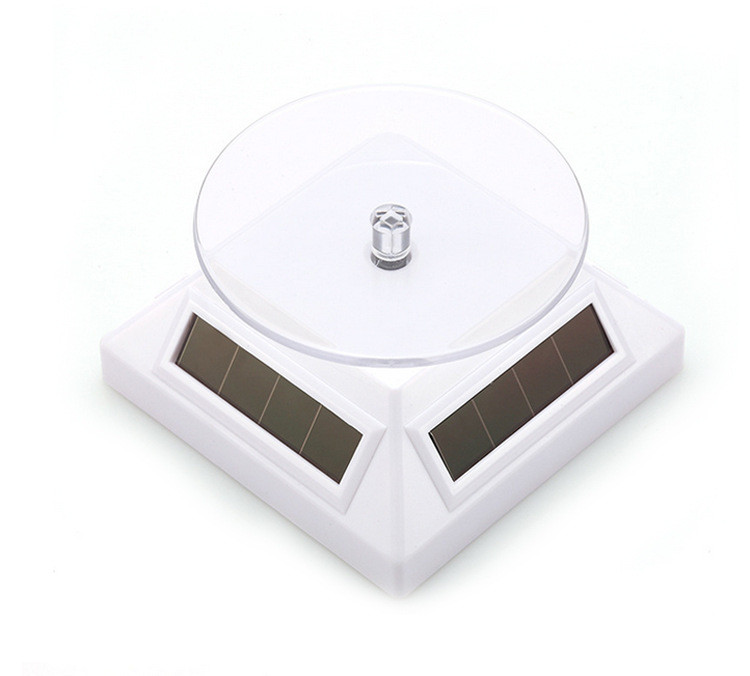 Black White 360 Degree Solar Powered Rotating Stand For Cosmetics