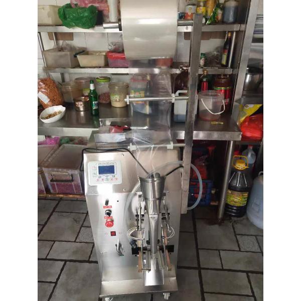 100ml Semi-Automatic Vertical Liquid Filling Sealing Packing Machine for Water Milk Sachet Bag Liquid Packing Machine