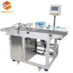 Photoelectric Sensor Controlled Intelligent Labeling Machine for Accurate