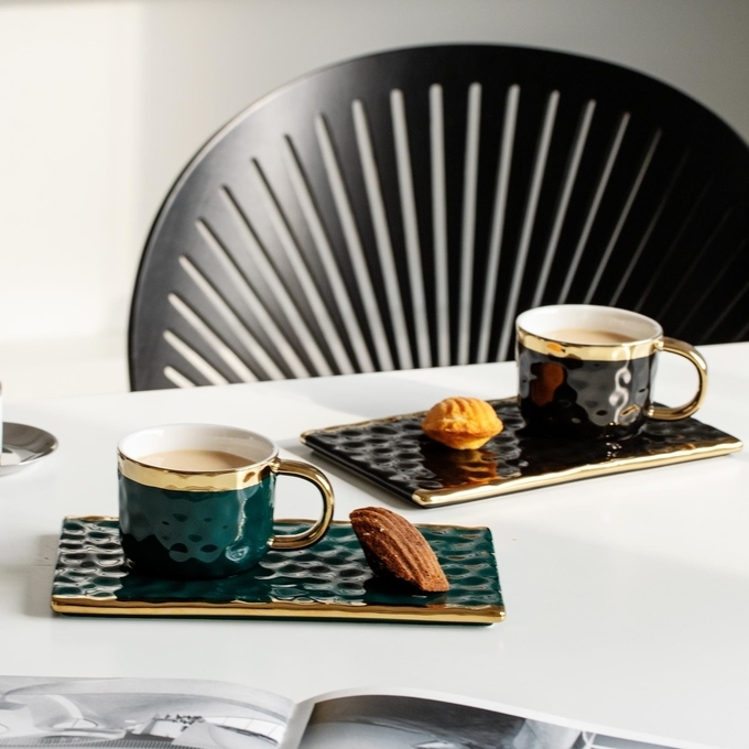 Elegant Black Ceramic Mugs With Gold Accents Wavy Textures For Coffee Tea Pastry Pairings Modern Minimalist Design