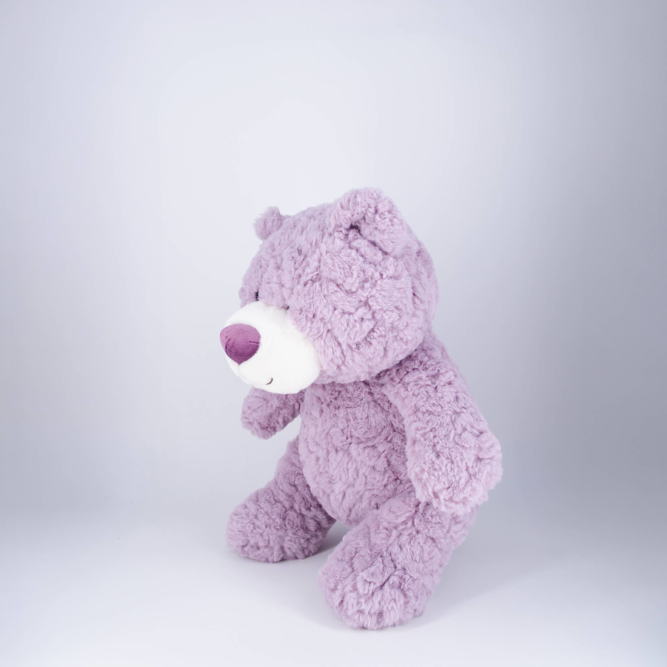 Producer Customizes Purple Teddy Bear Plush Toys With Small Bear Design.
