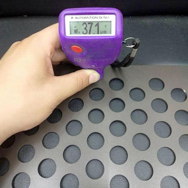 A tester is used to test the zinc content of the perforated metal