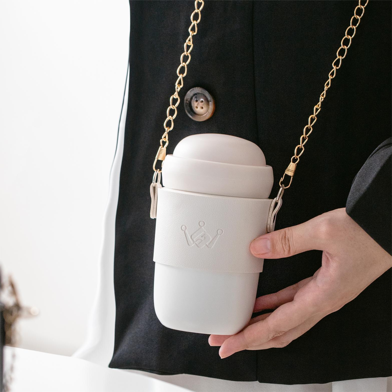 Gradient pink ceramic water bottle with gold chain strap