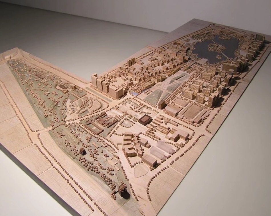 Architectural Model of a Modern Urban Complex with Illuminated Buildings and Landscaped Features