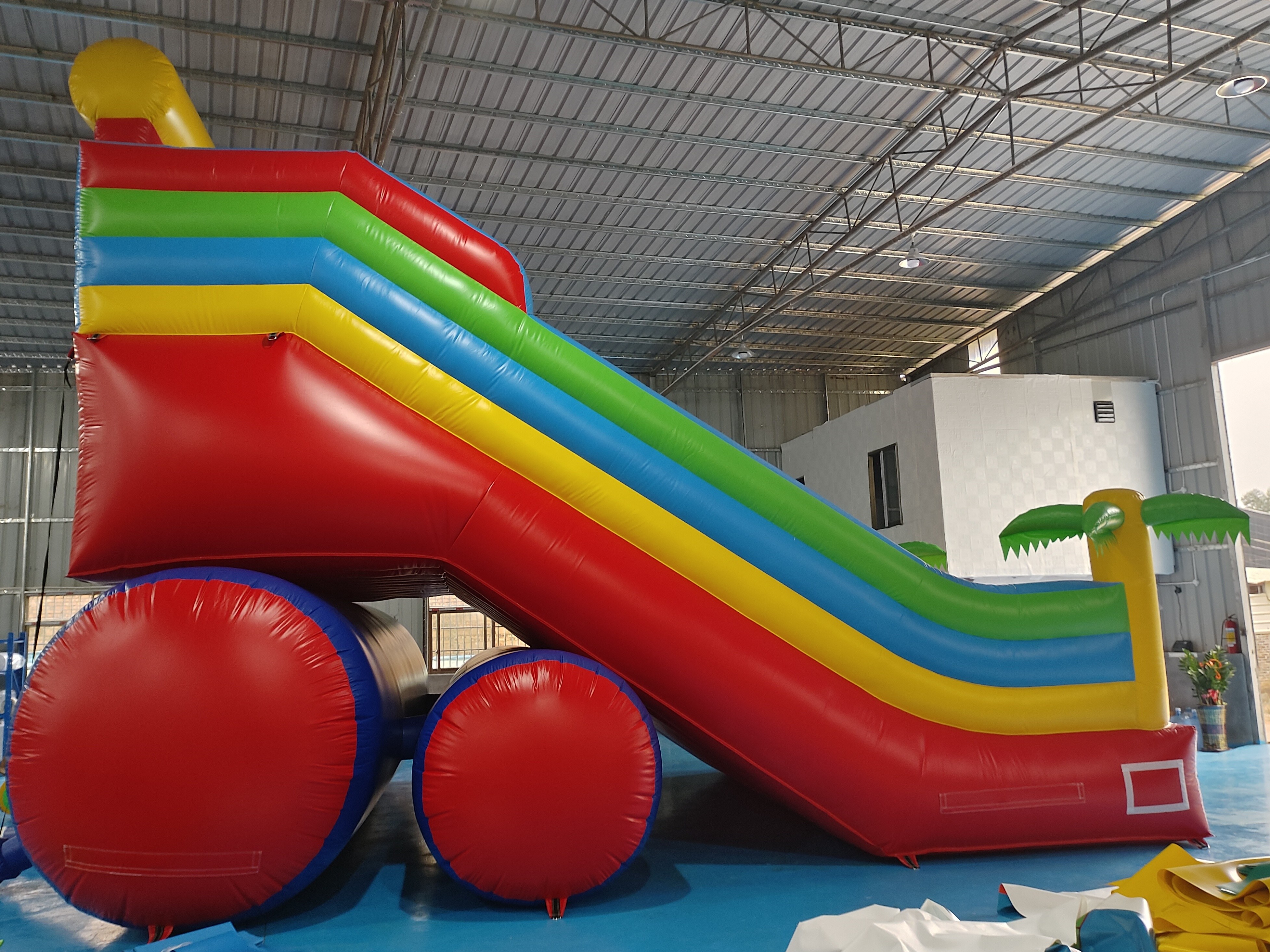 New Design Tarpaulin Fireproof Commercial Inflatable High Slide Palm Theme Giant Inflatable Slide Castle For Kids And Ad