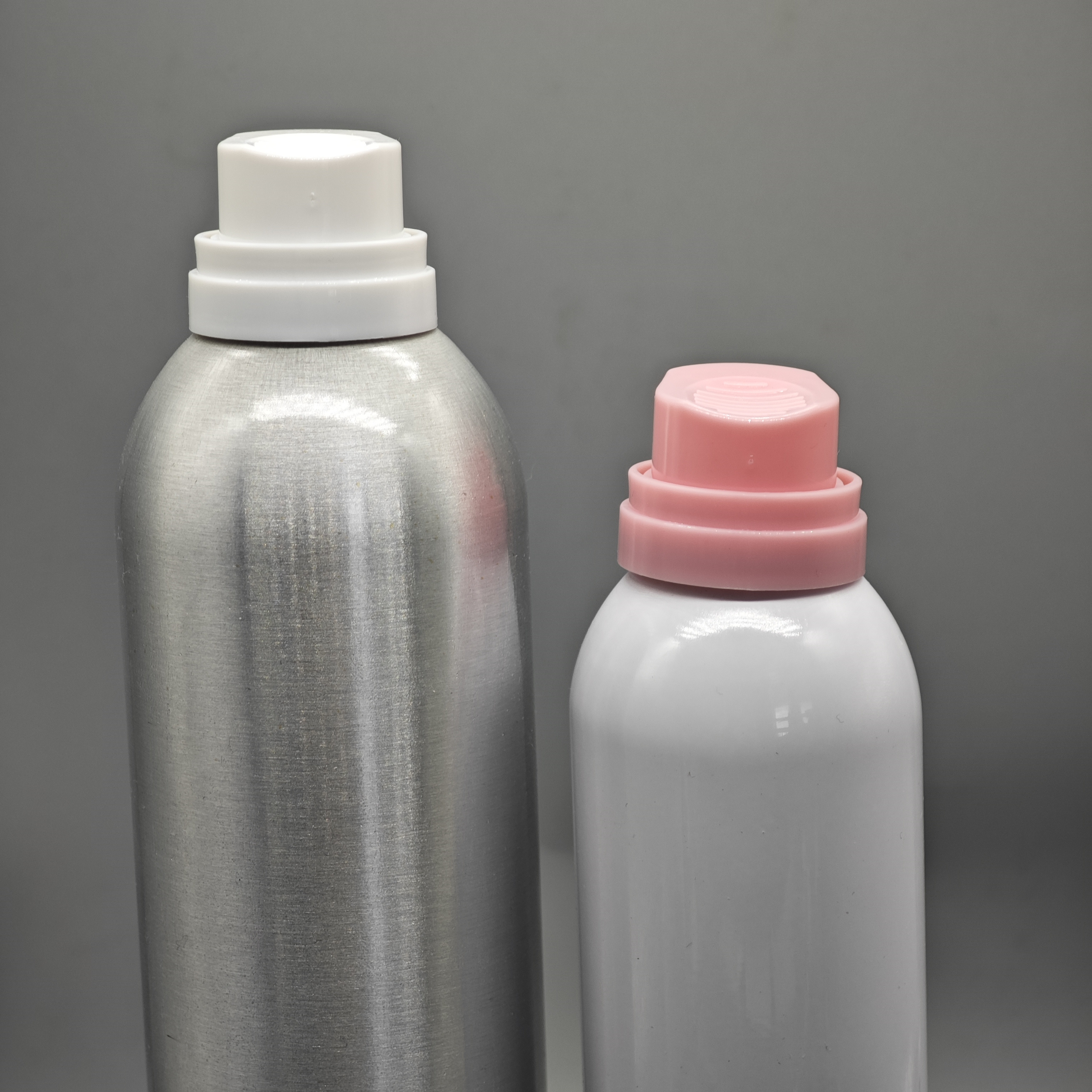 Close-up of shaving foam aerosol valve and actuator