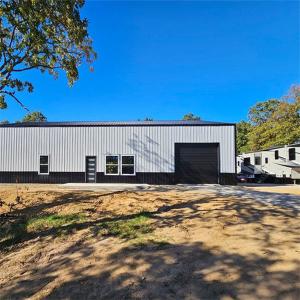 China Portal Frame Steel Structure Workshop With Rolled Up Door on sale